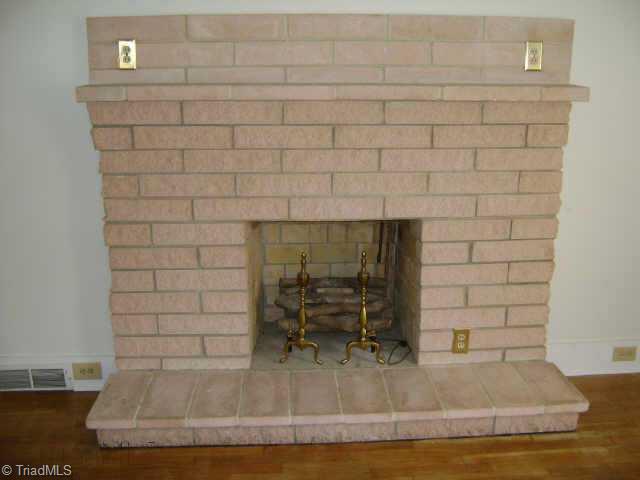 495 Reeves Mill Road Mount Airy, NC 27030 - Photo 7 of 9 Other. Split faced rock fireplace with mantel, hearth and electric logs