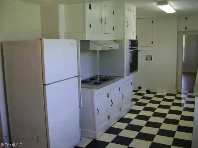 495 Reeves Mill Road Mount Airy, NC 27030 - Photo 9 of 9 Other. Large kitchen with refrigerator, electric cooktop, and built in oven