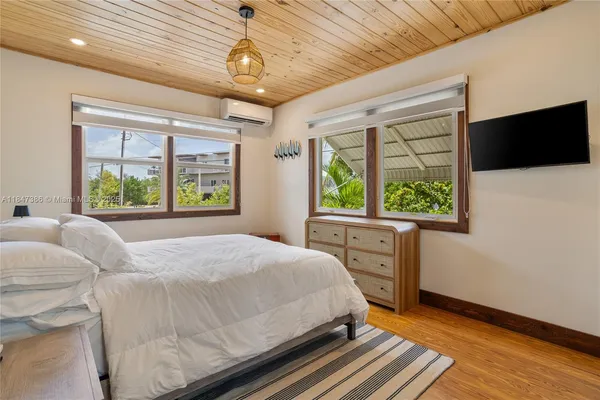 a view of swimming pool with outdoor seating