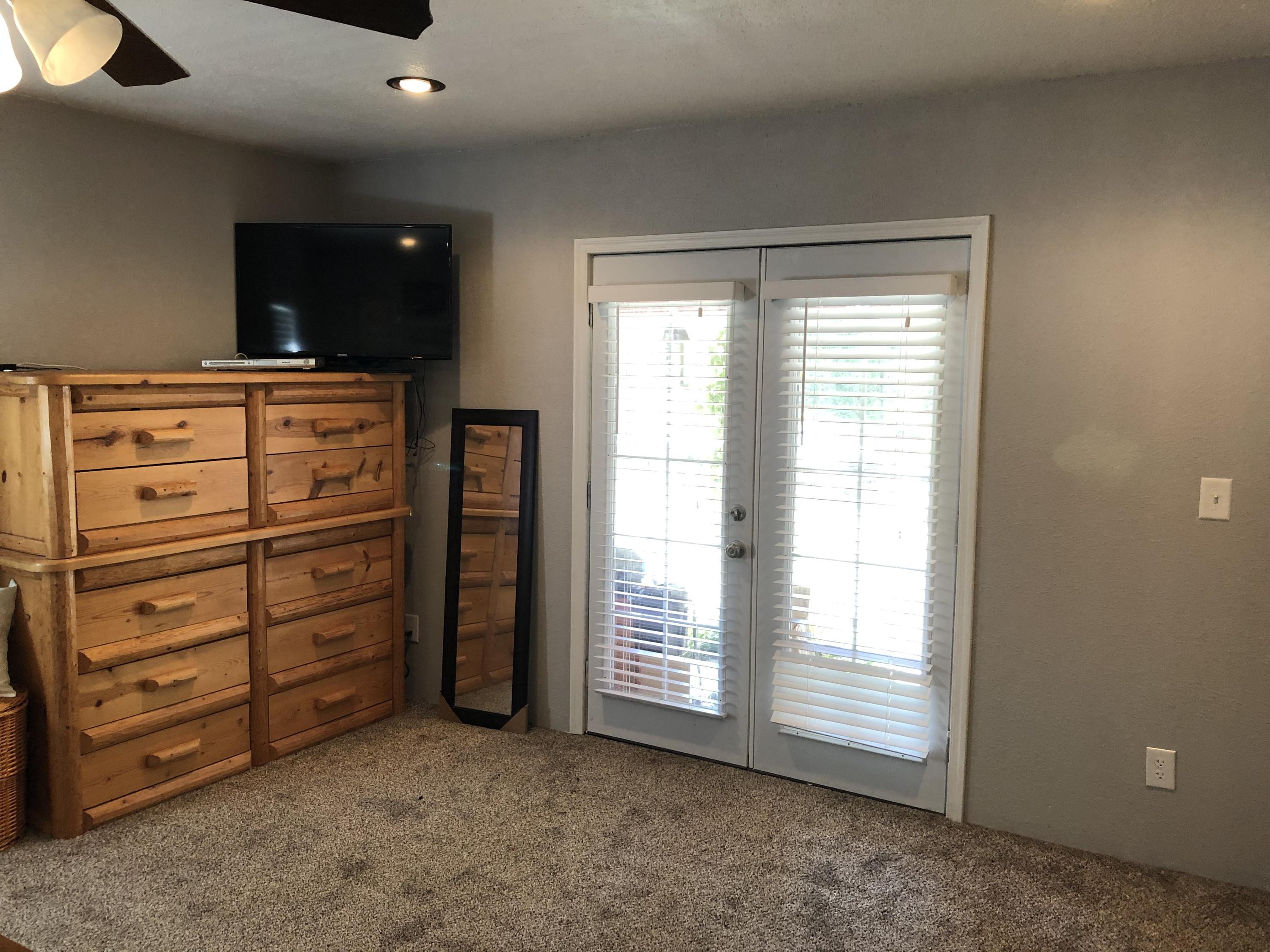441 Upper Applegate Road Jacksonville, OR 97530 - Photo 15 of 25 a view of room with furniture and a window