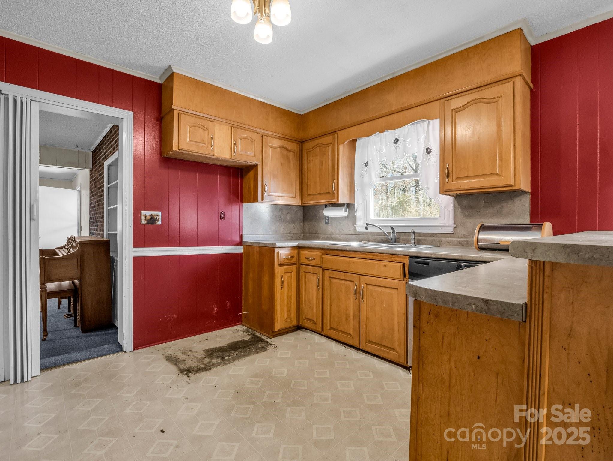 127 Mapp Street Spindale, NC 28160 - Photo 16 of 32 a kitchen that has a sink and a stove