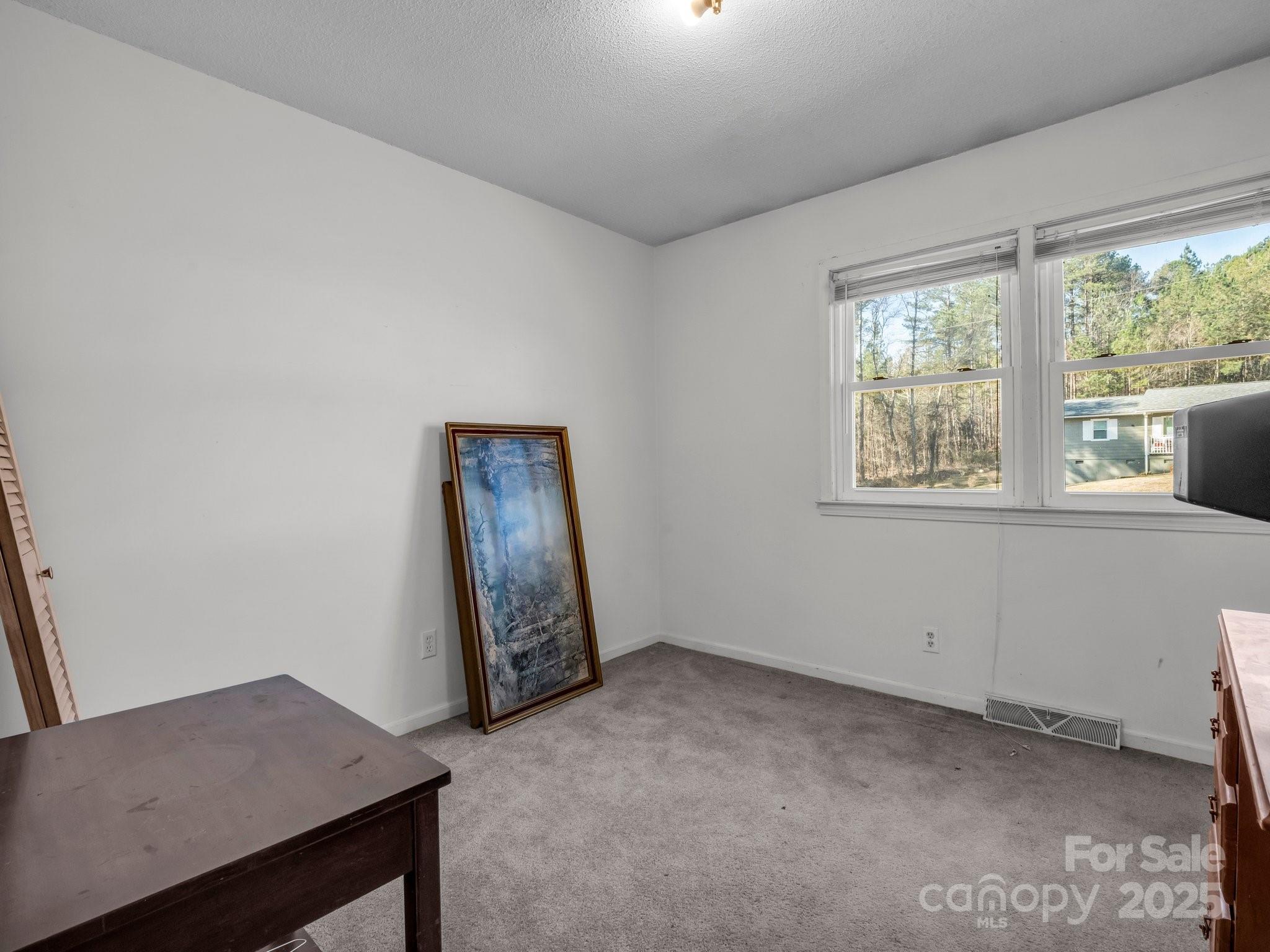 127 Mapp Street Spindale, NC 28160 - Photo 28 of 32 a view of an empty room and window