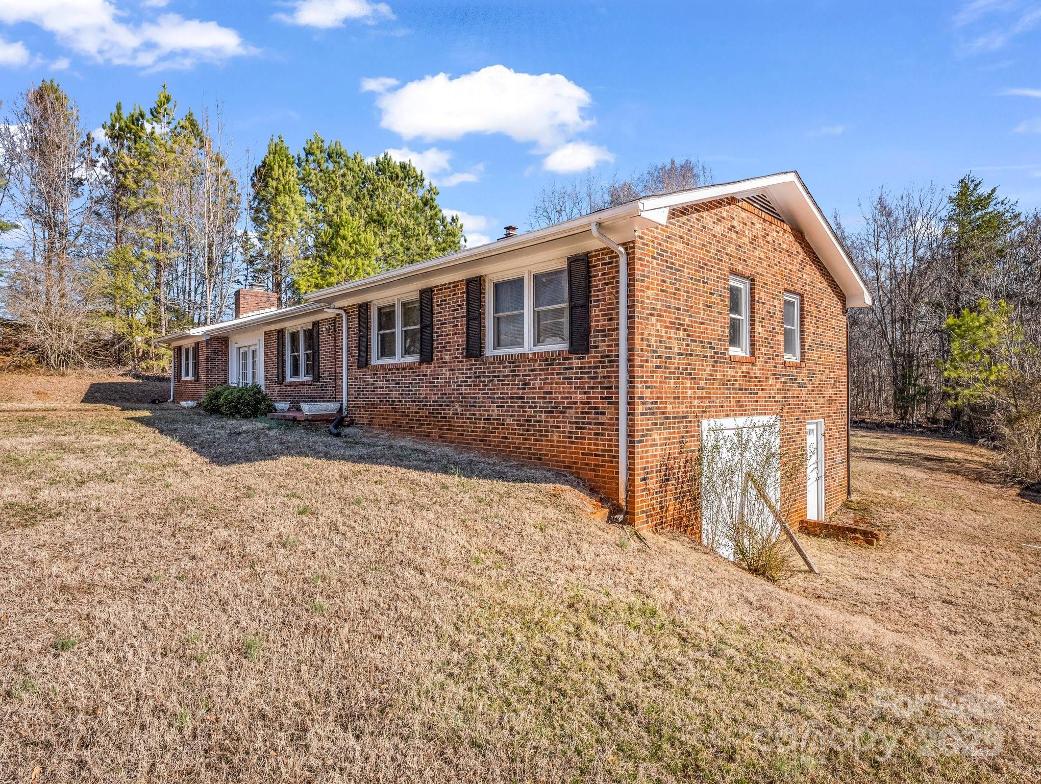 127 Mapp Street Spindale, NC 28160 - Photo 3 of 32 a front view of a house with a yard