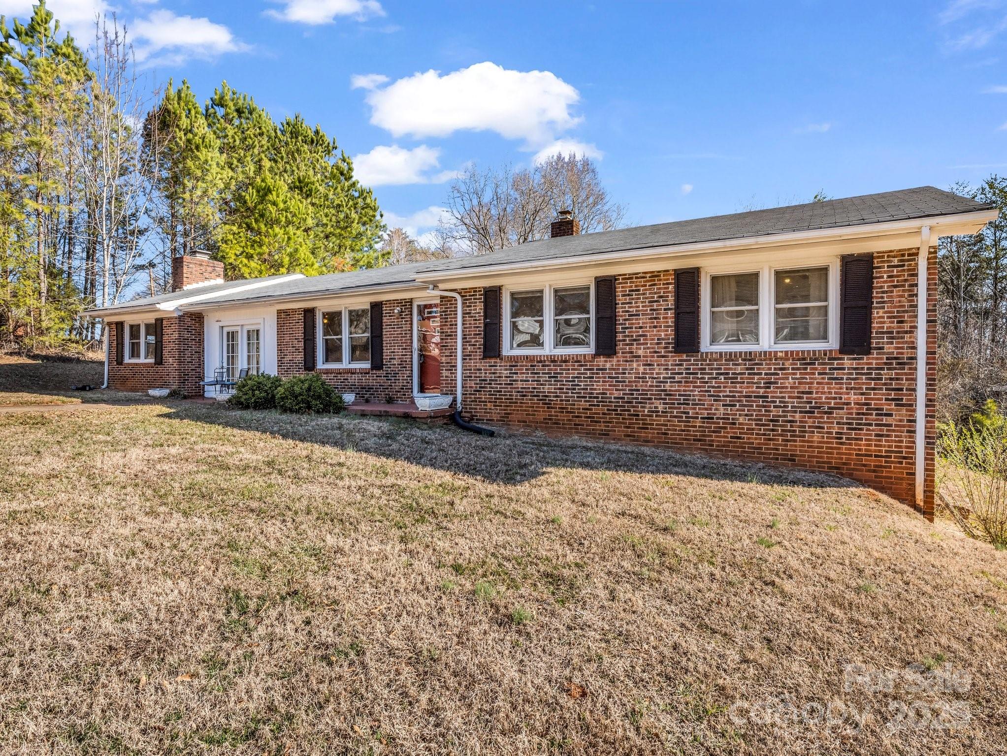 127 Mapp Street Spindale, NC 28160 - Photo 4 of 32 a front view of a house with garden