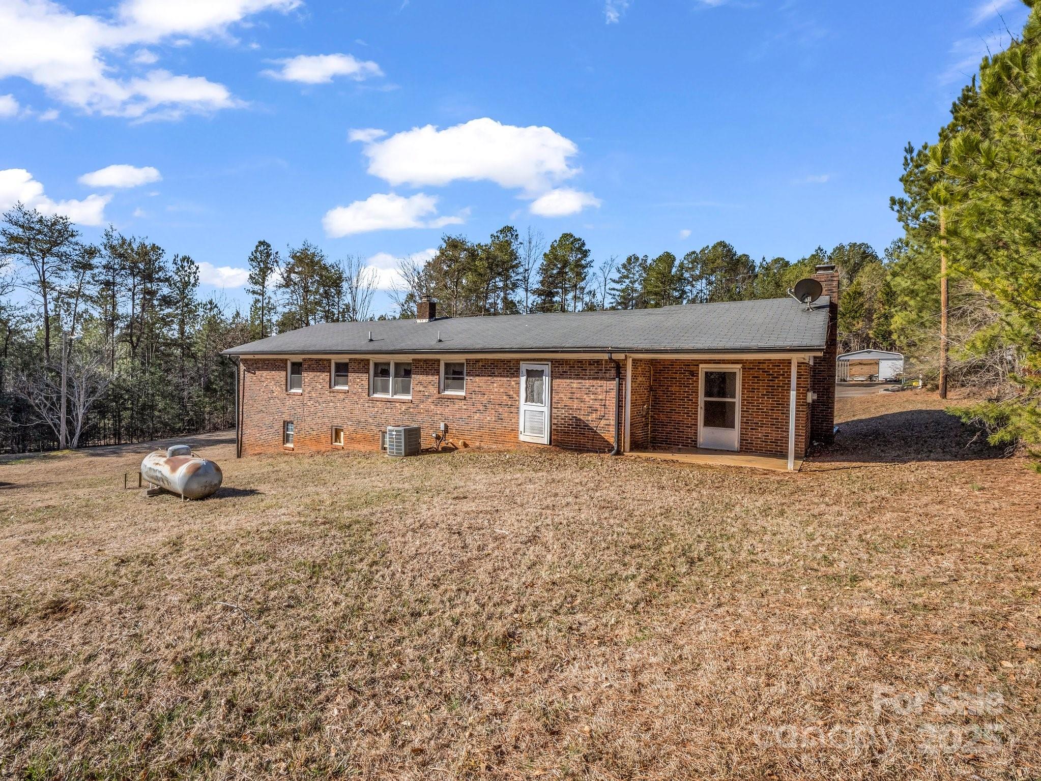 127 Mapp Street Spindale, NC 28160 - Photo 8 of 32 a view of a house with a backyard