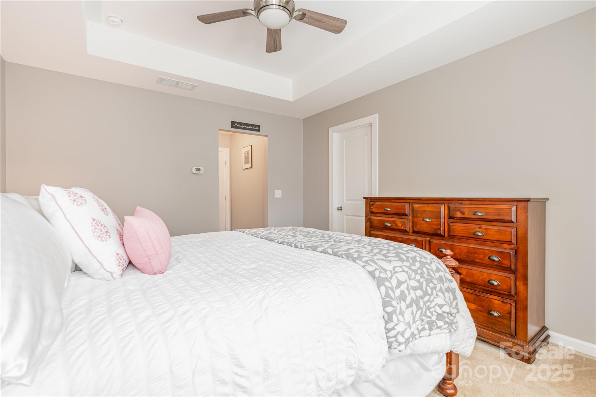 1005 Archibald Avenue Fort Mill, SC 29708 - Photo 37 of 42 a bedroom with a bed and a lamp