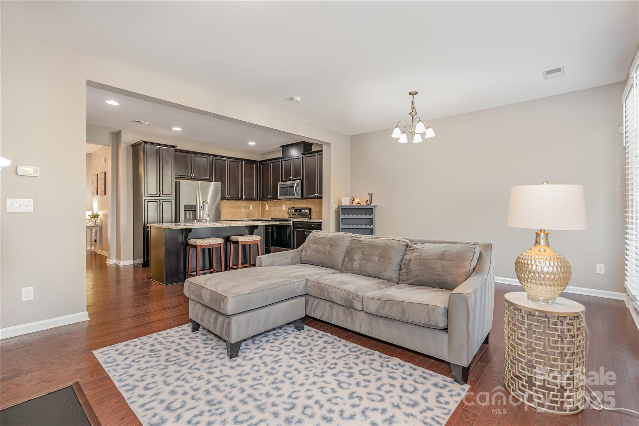 1005 Archibald Avenue Fort Mill, SC 29708 - Photo 10 of 42 a living room with furniture and a rug