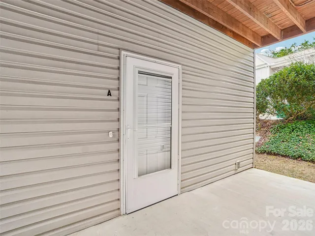 a view of a house with a white door