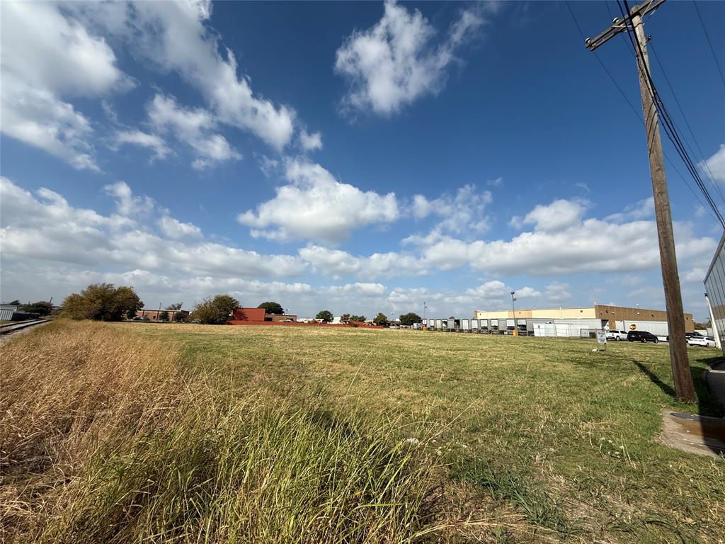 4801 Seldon Way Dallas, TX 75227 - Photo 3 of 3 a view of a big yard with an outdoor space and seating