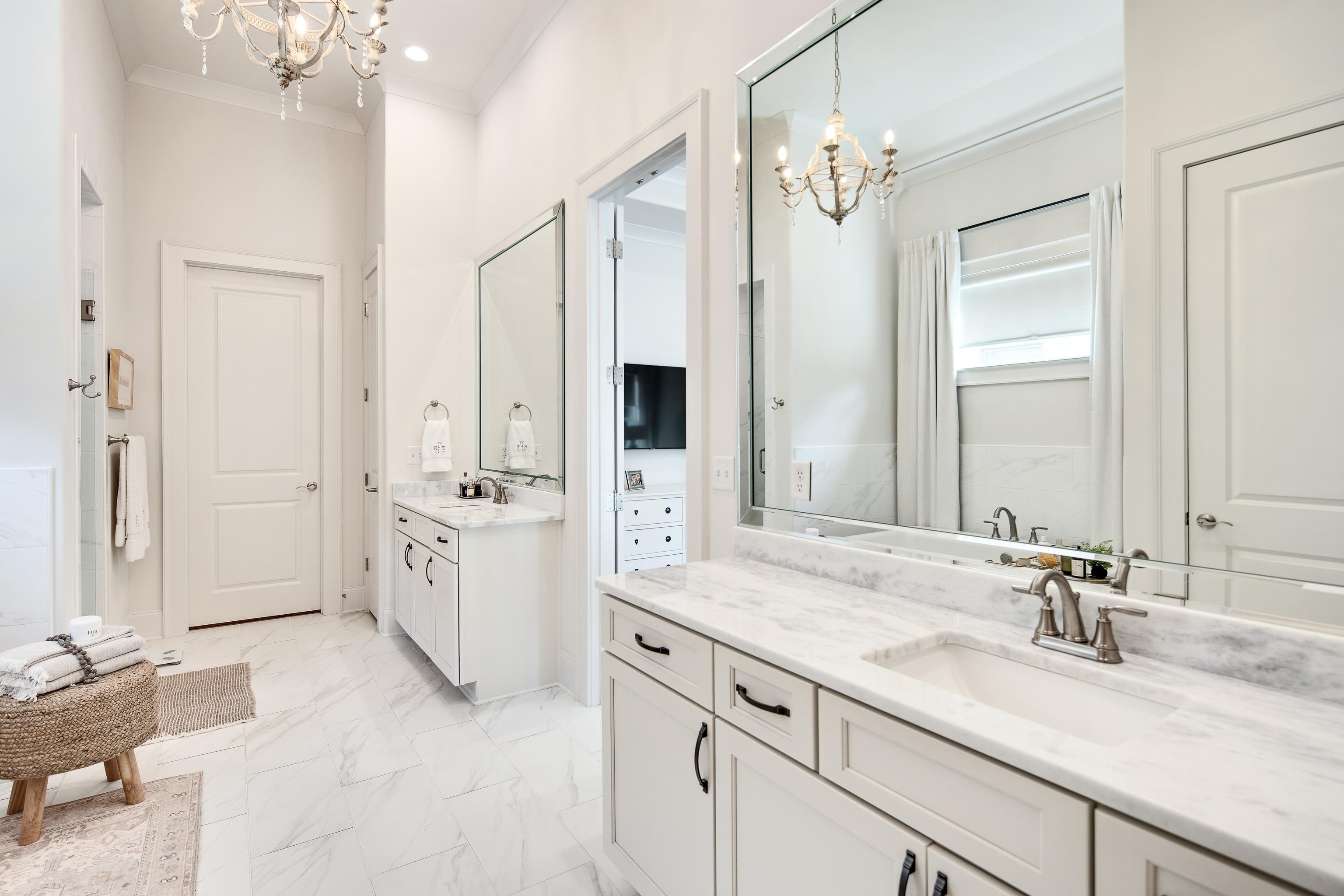 1389 Peyton Parkway Collierville, TN 38017 - Photo 17 of 38 a spacious bathroom with a granite countertop sink mirror and a shower