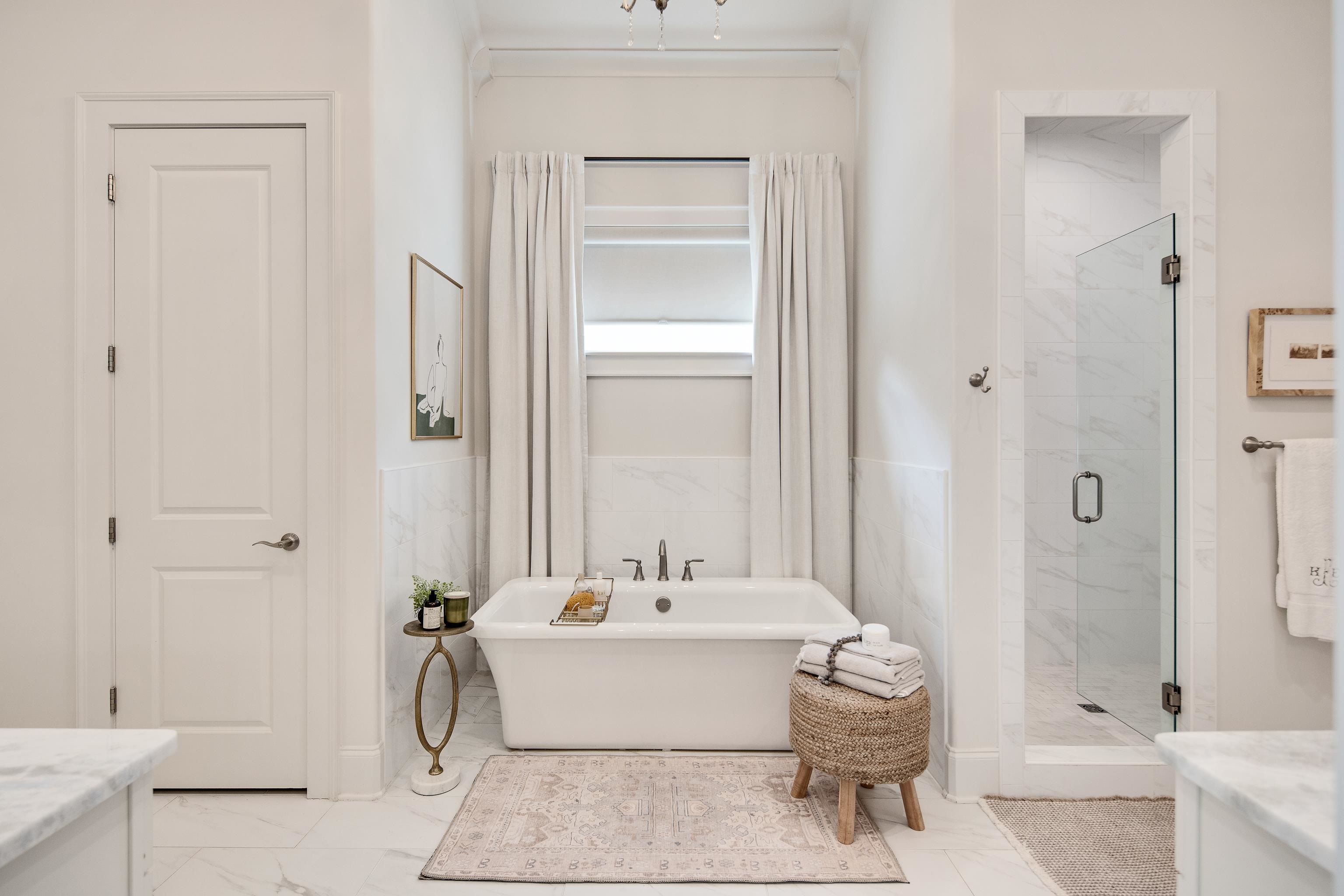 1389 Peyton Parkway Collierville, TN 38017 - Photo 19 of 38 a bathroom with a tub shower and sink