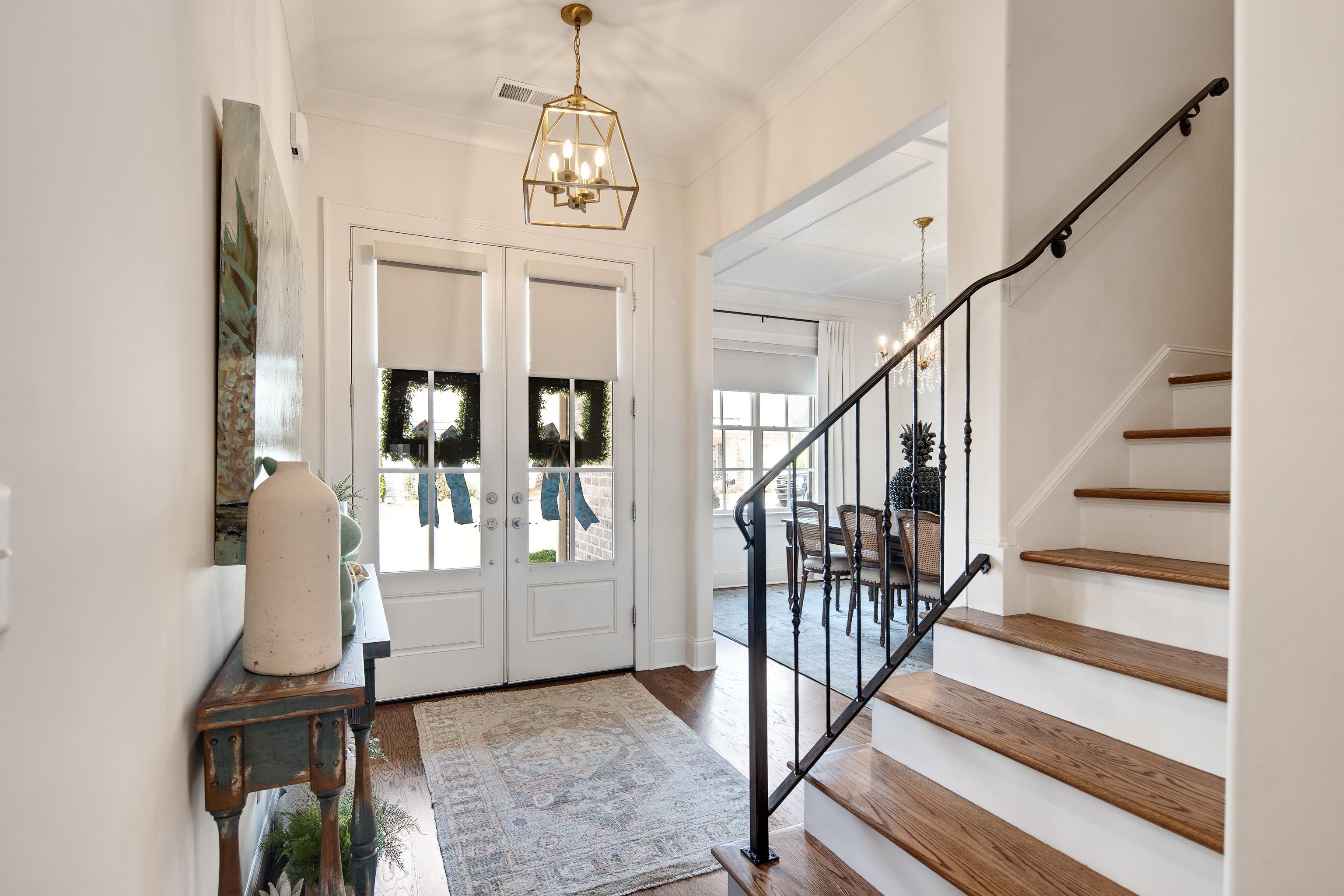 1389 Peyton Parkway Collierville, TN 38017 - Photo 2 of 38 a view of entryway and hall with wooden floor