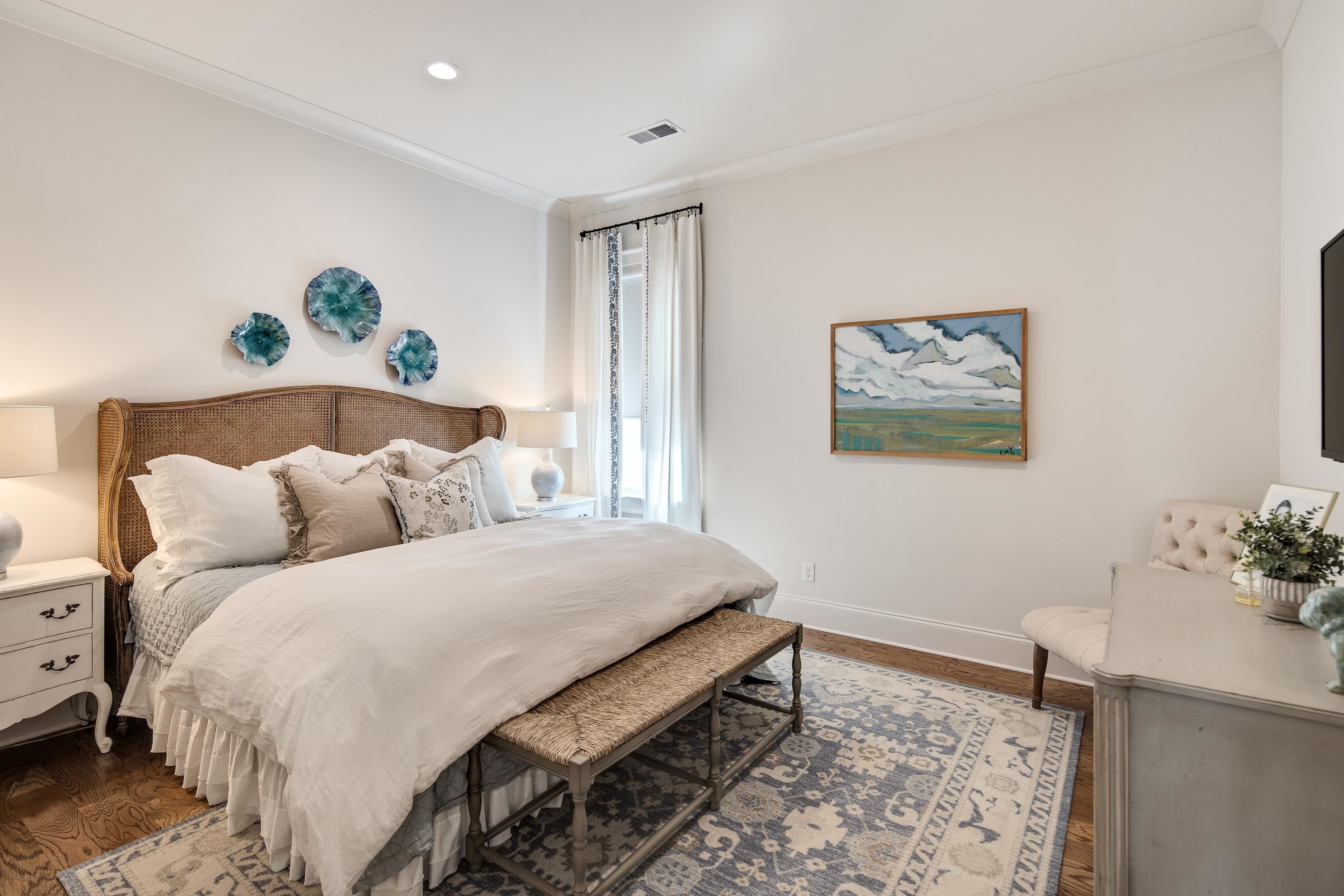 1389 Peyton Parkway Collierville, TN 38017 - Photo 21 of 38 a bedroom with a bed and painting on the wall