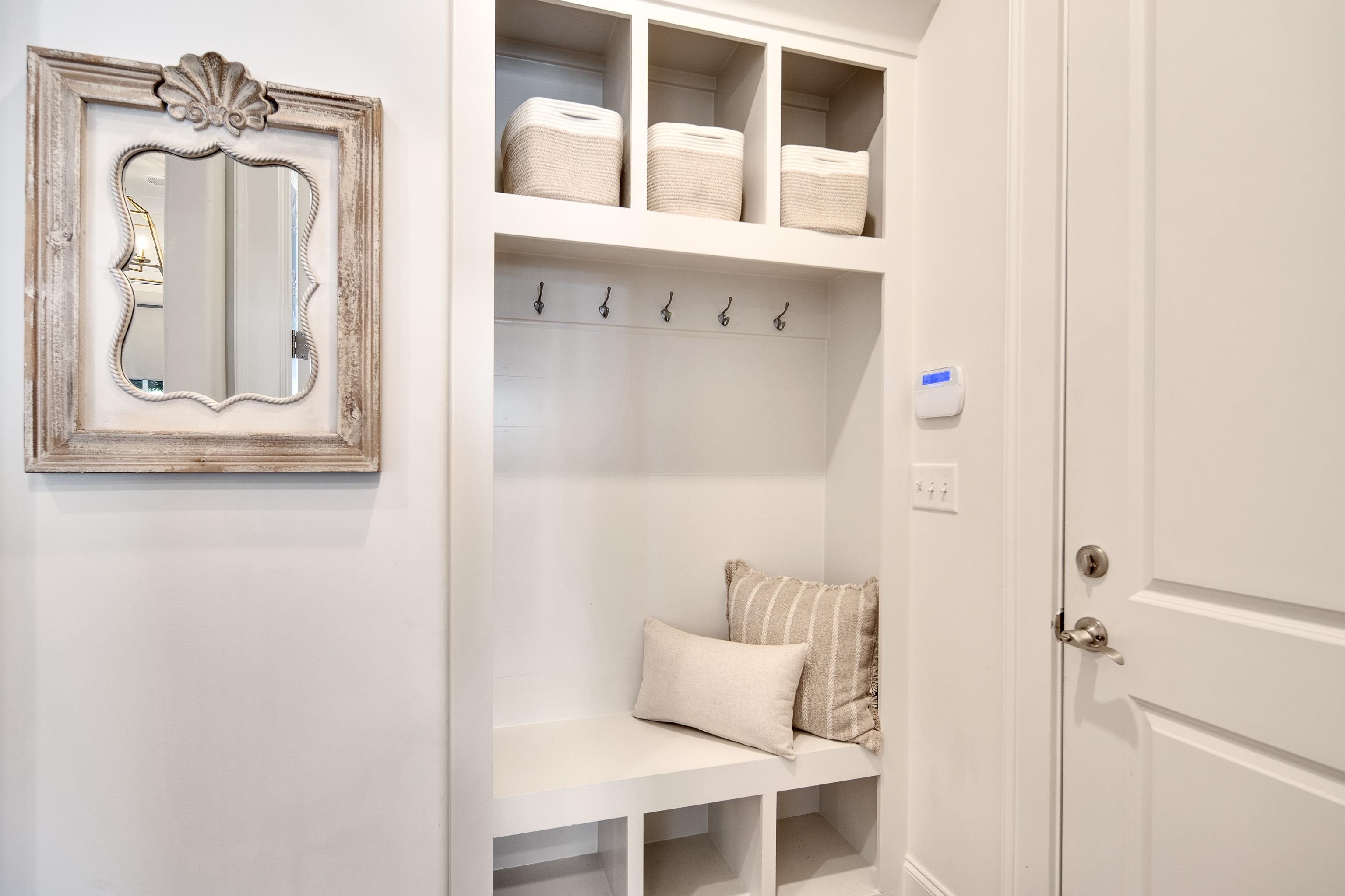 1389 Peyton Parkway Collierville, TN 38017 - Photo 24 of 38 a bedroom with a bed and a mirror