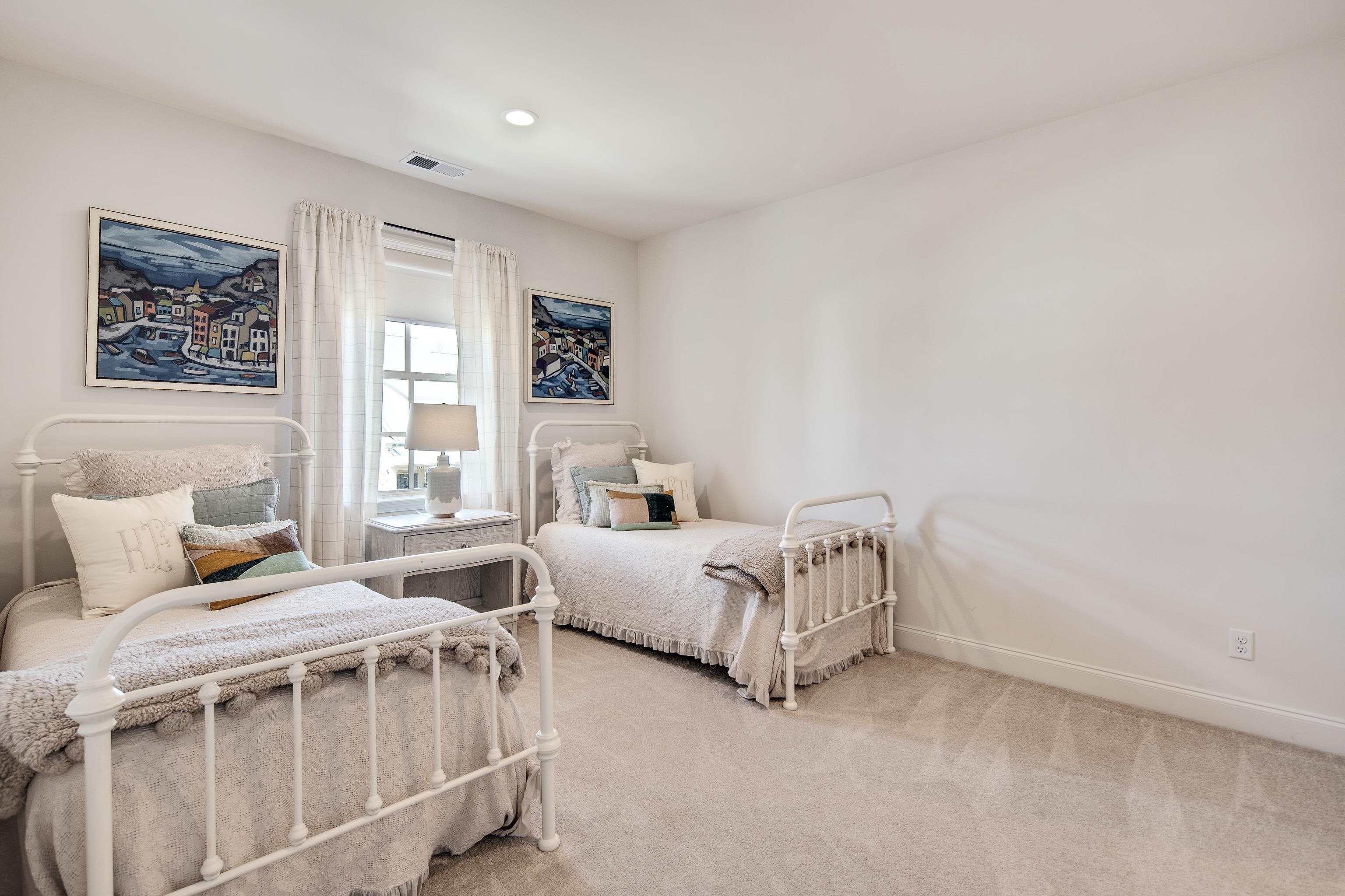 1389 Peyton Parkway Collierville, TN 38017 - Photo 29 of 38 a bedroom with furniture and windows