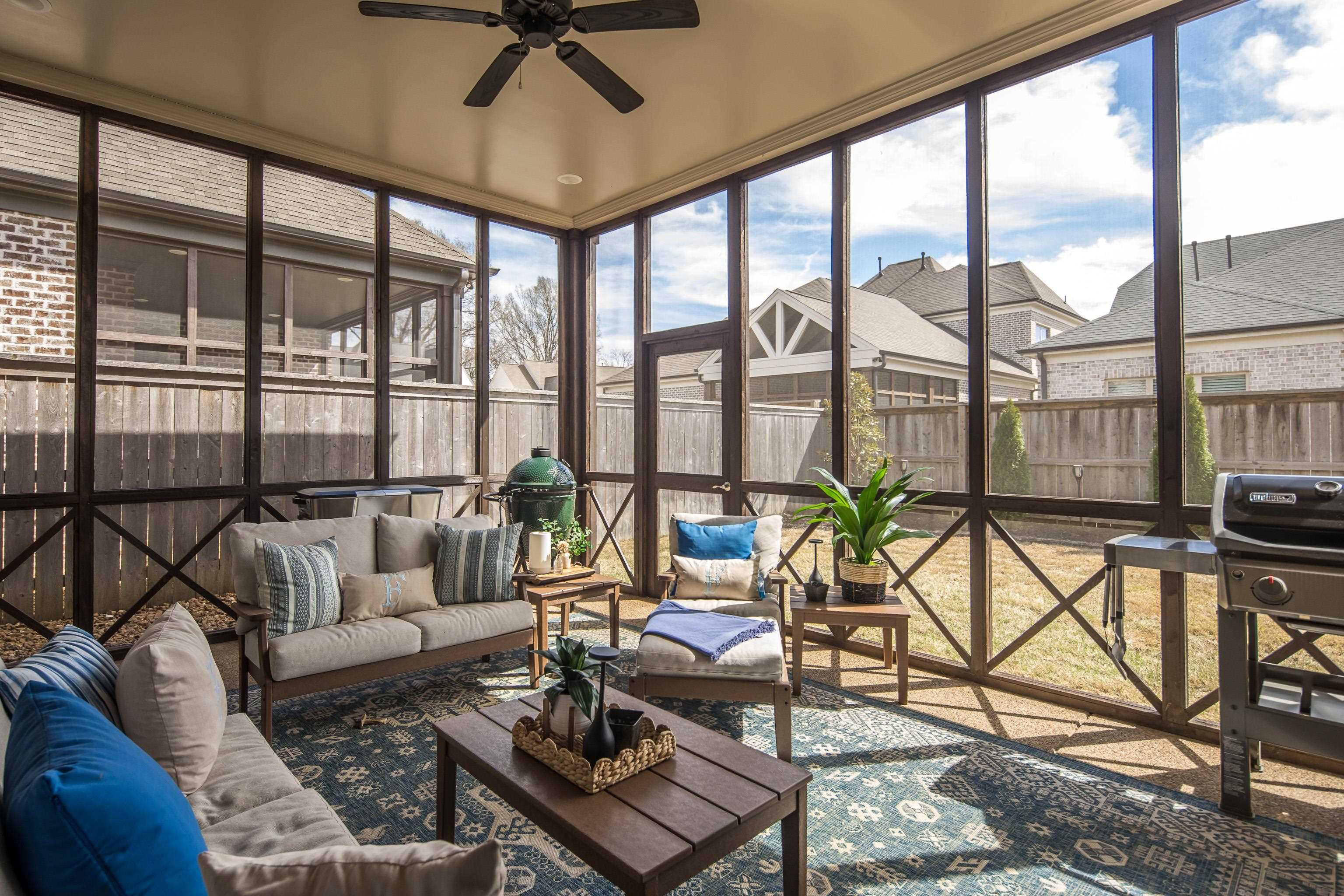 1389 Peyton Parkway Collierville, TN 38017 - Photo 36 of 38 a living room with furniture and a floor to ceiling windows