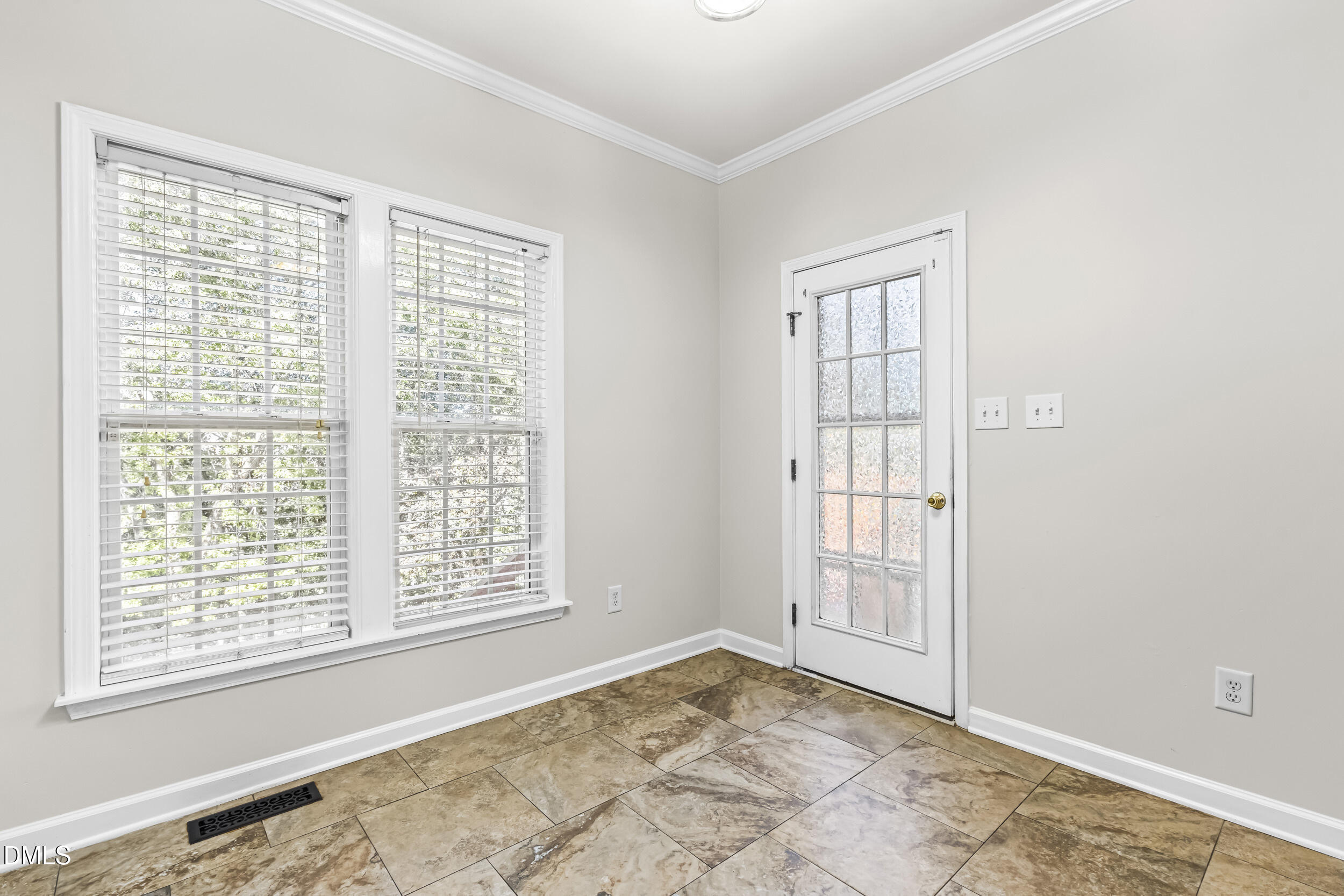 4809 Elmhurst Ridge Court Raleigh, NC 27616 - Photo 16 of 46 a view of an empty room with a window