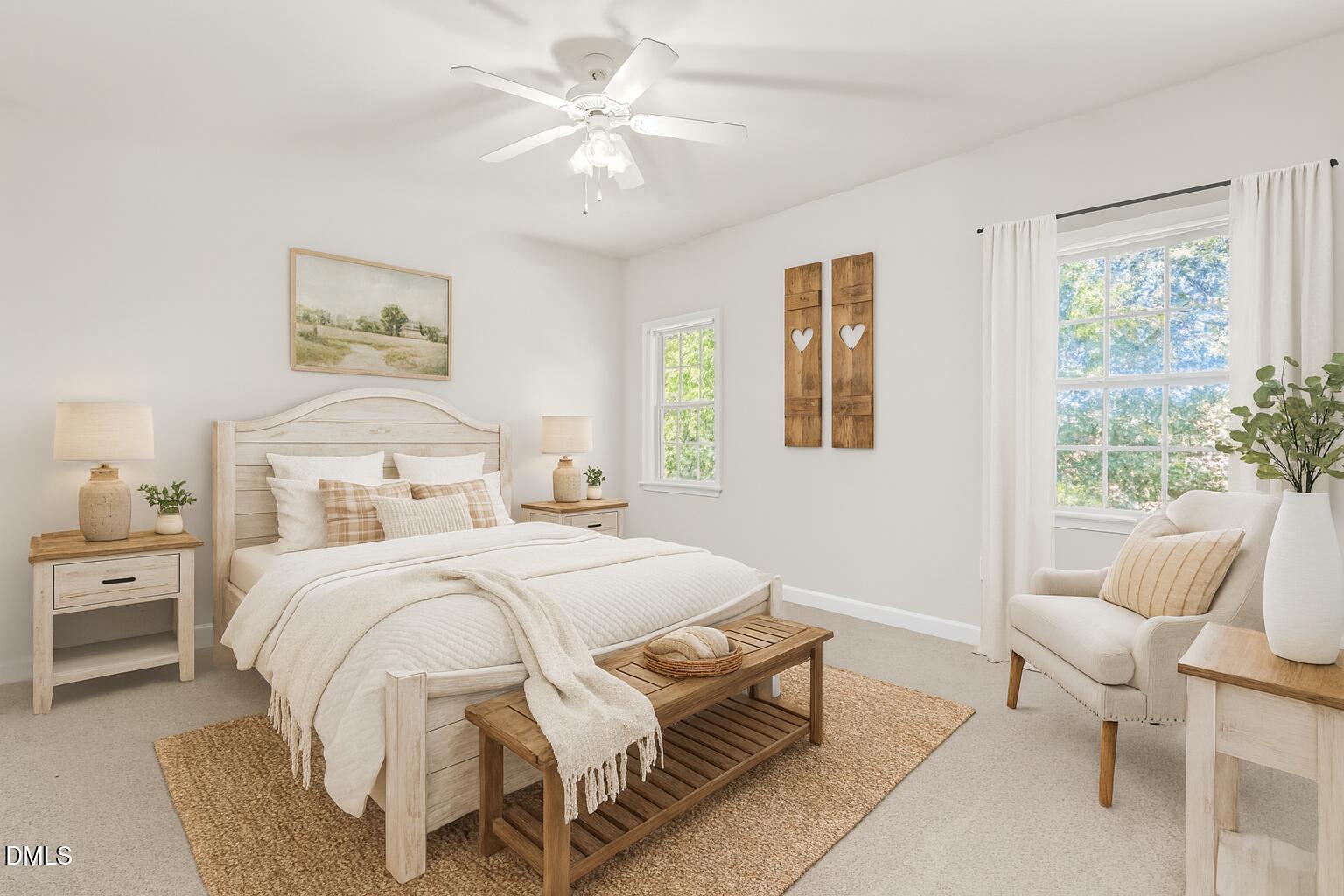 4809 Elmhurst Ridge Court Raleigh, NC 27616 - Photo 18 of 46 a bedroom with a bed and a chandelier