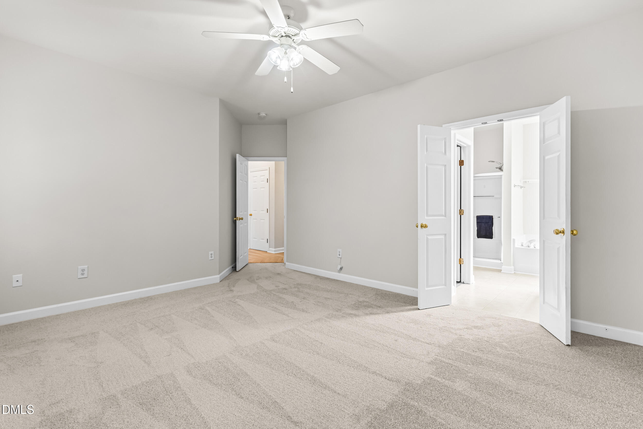 4809 Elmhurst Ridge Court Raleigh, NC 27616 - Photo 19 of 46 a view of an empty room and chandelier fan