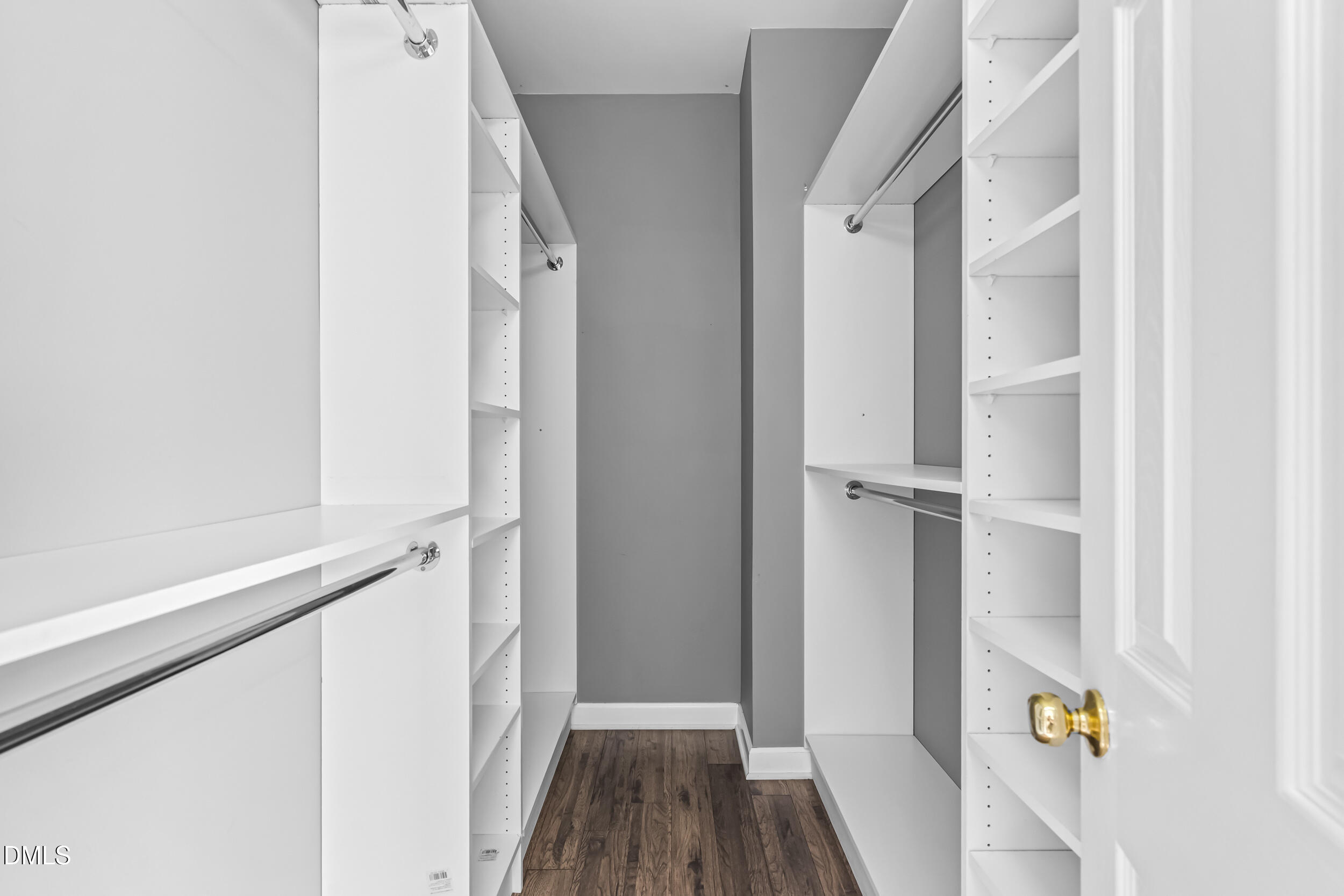 4809 Elmhurst Ridge Court Raleigh, NC 27616 - Photo 22 of 46 a view of a hallway view with wooden floor and staircase