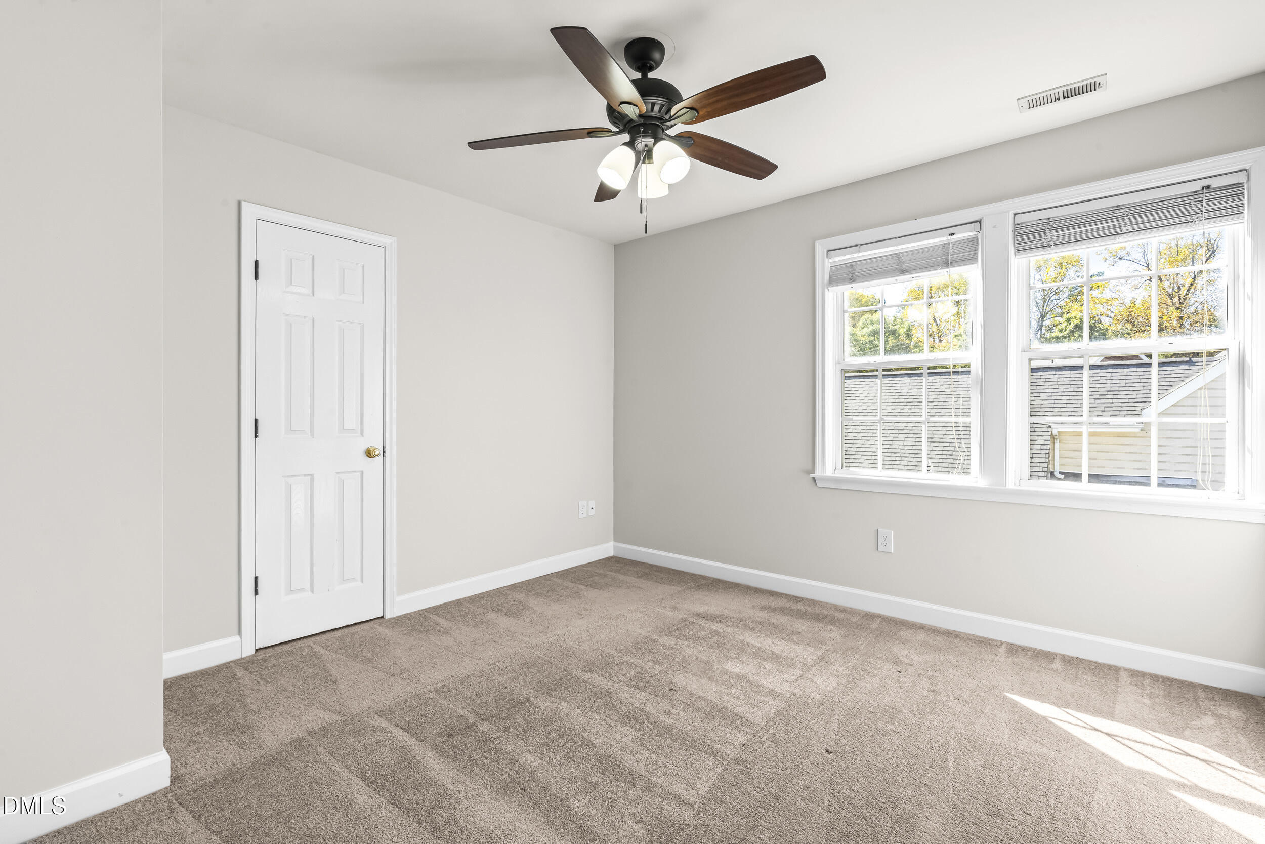 4809 Elmhurst Ridge Court Raleigh, NC 27616 - Photo 24 of 46 a view of an empty room with a window