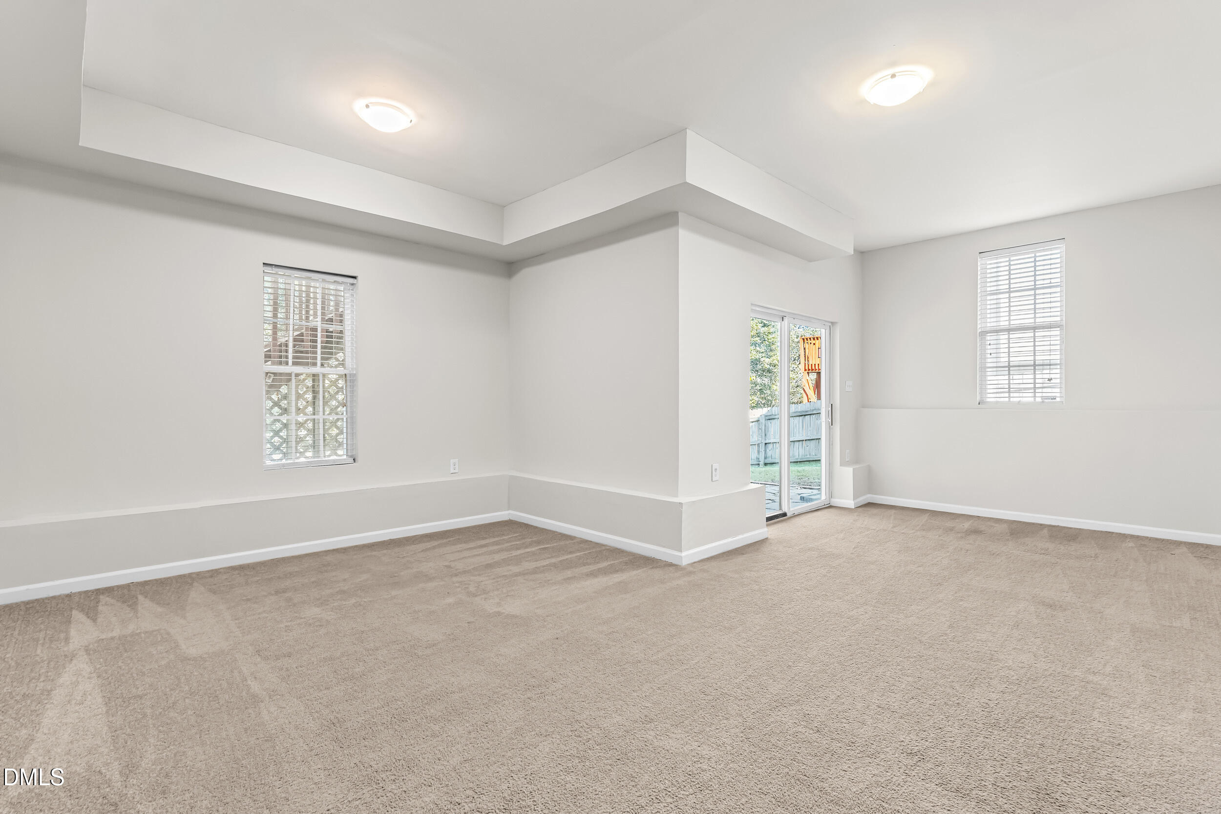 4809 Elmhurst Ridge Court Raleigh, NC 27616 - Photo 34 of 46 an empty room with windows