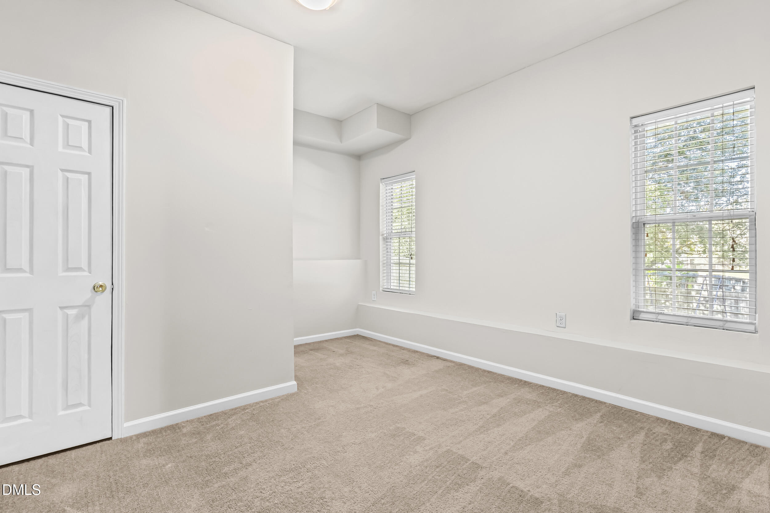 4809 Elmhurst Ridge Court Raleigh, NC 27616 - Photo 37 of 46 an empty room with windows