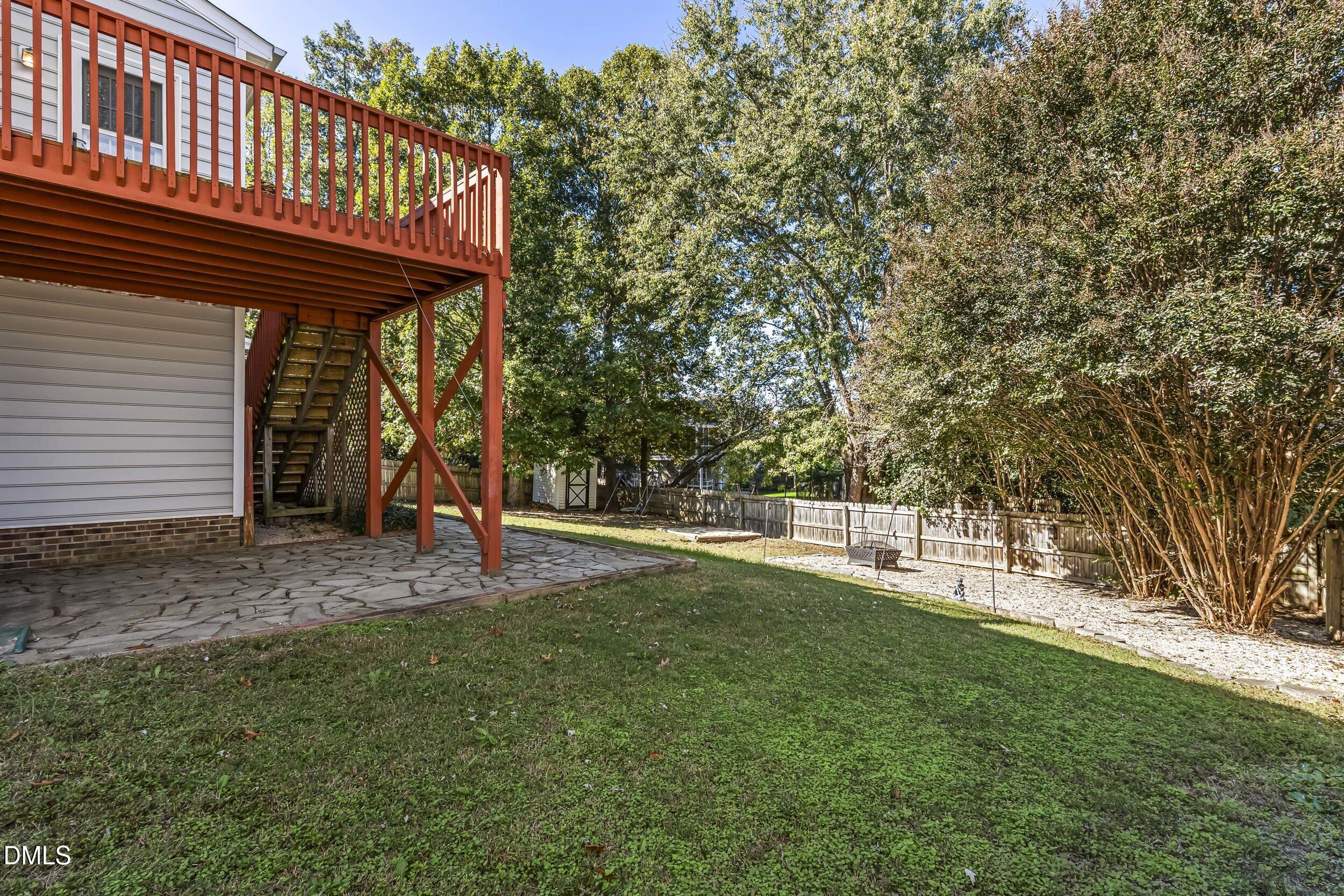 4809 Elmhurst Ridge Court Raleigh, NC 27616 - Photo 41 of 46 a view of a house with a backyard