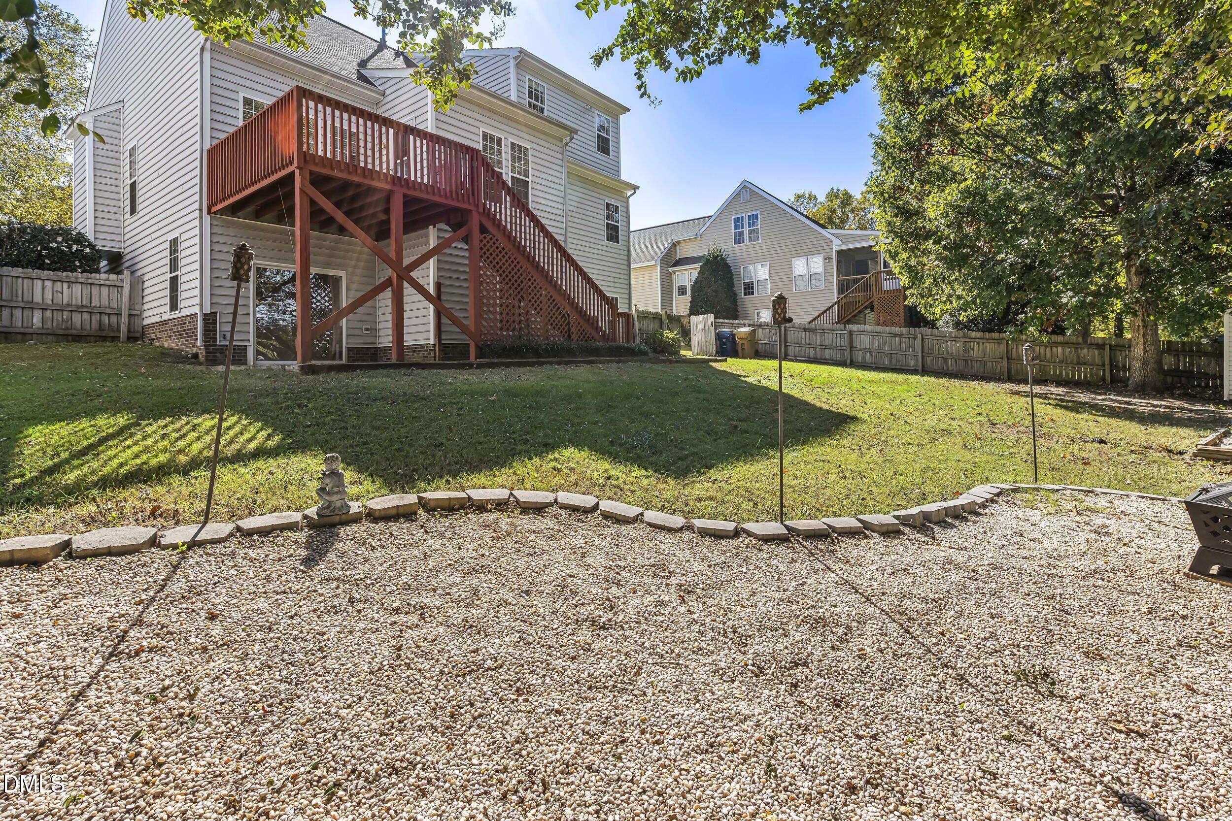 4809 Elmhurst Ridge Court Raleigh, NC 27616 - Photo 42 of 46 a view of a house with a yard