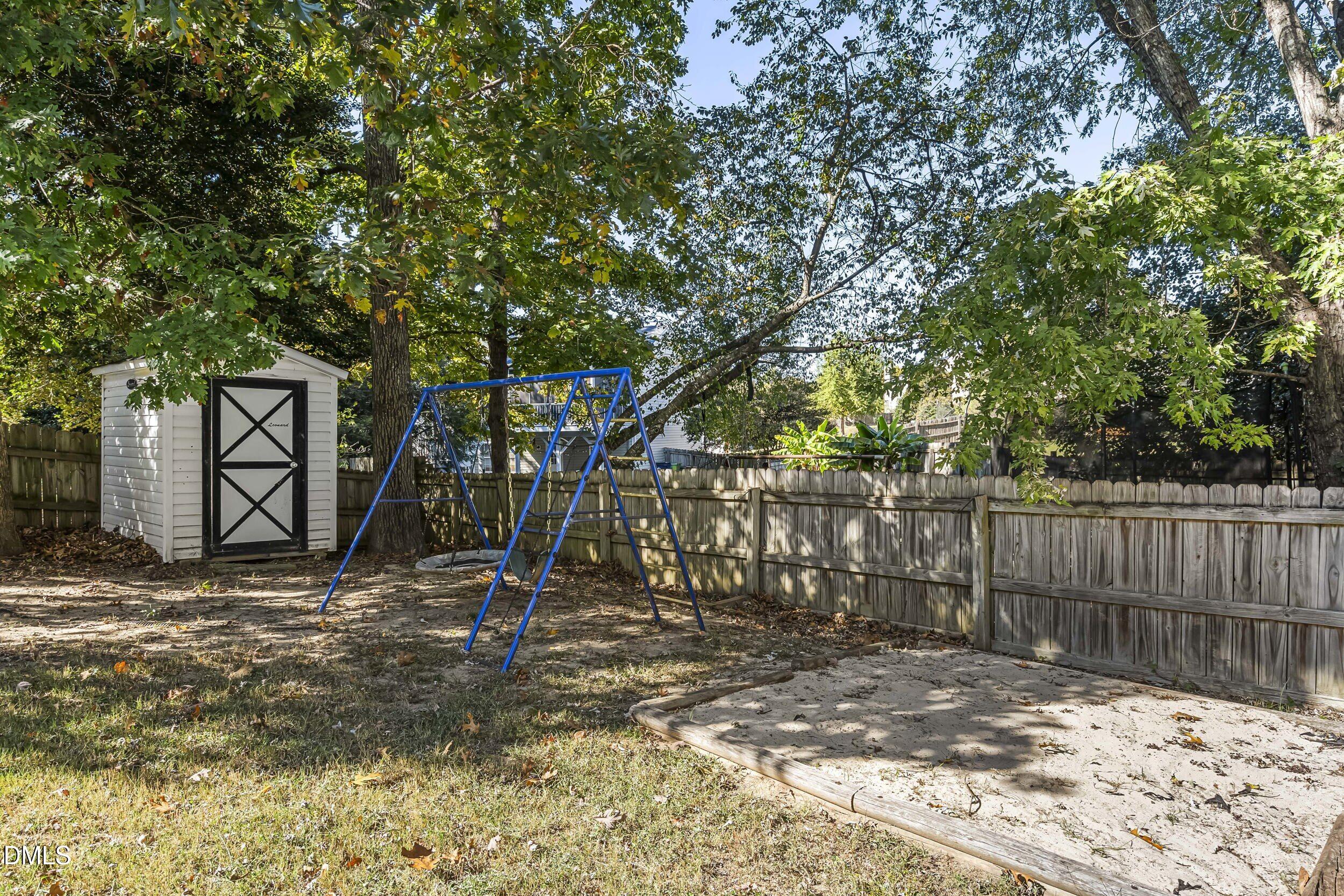 4809 Elmhurst Ridge Court Raleigh, NC 27616 - Photo 43 of 46 a view of outdoor space with wooden fence
