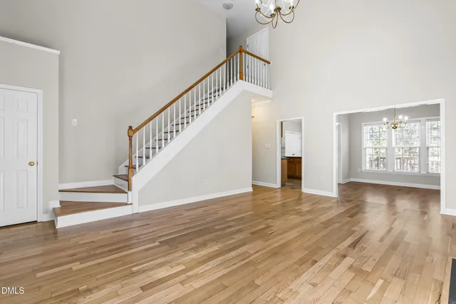 a view of an entryway with wooden floor