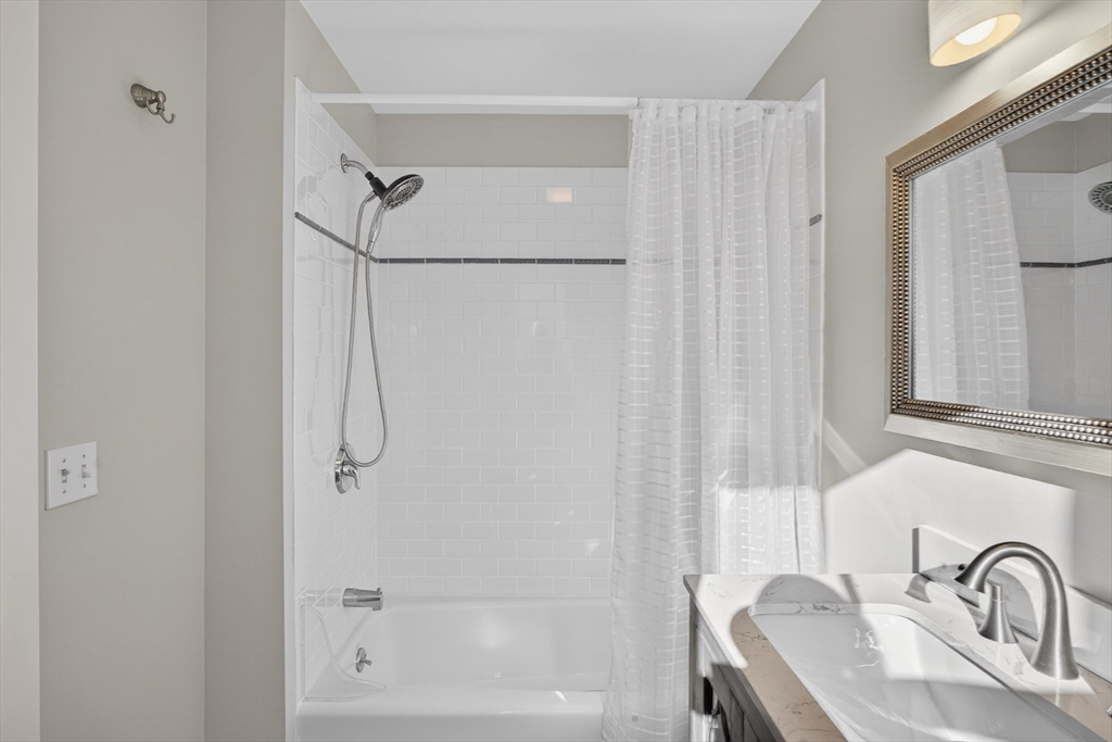 16 Conwell Street, Unit 3 Provincetown, MA 02657 - Photo 29 of 41 a bathroom with a sink and a shower