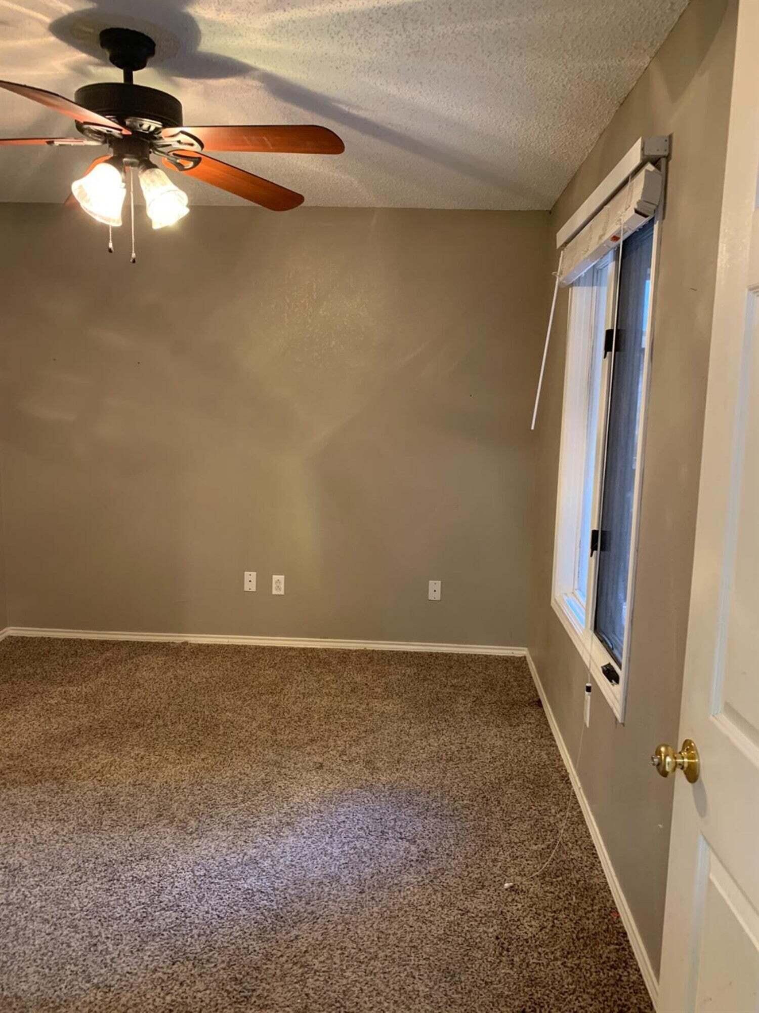 8308 Raleigh Avenue, Unit A Lubbock, TX 79424 - Photo 9 of 14 en view of an empty room