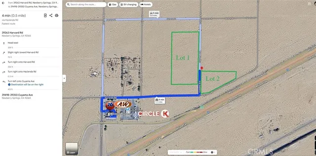 a view of a hallway with painting on the wall