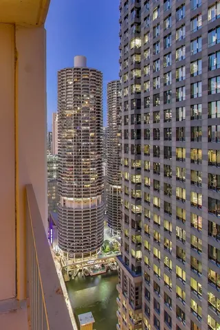 a view of a balcony with a bench