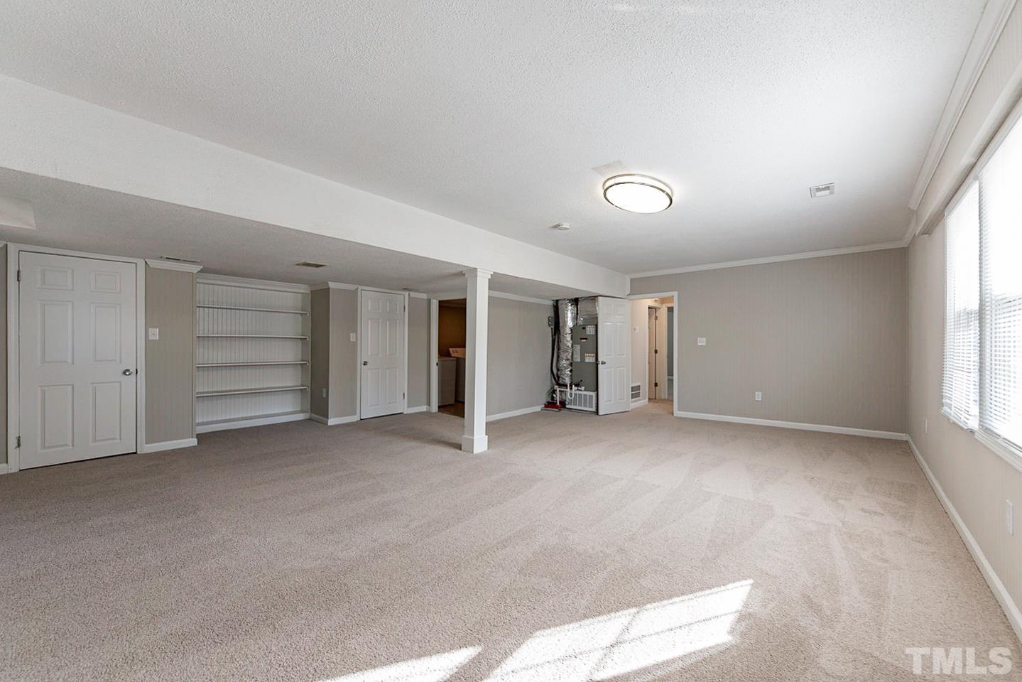 3601 Dixon Road Durham, NC 27707 - Photo 19 of 27 a view of an empty room with a window