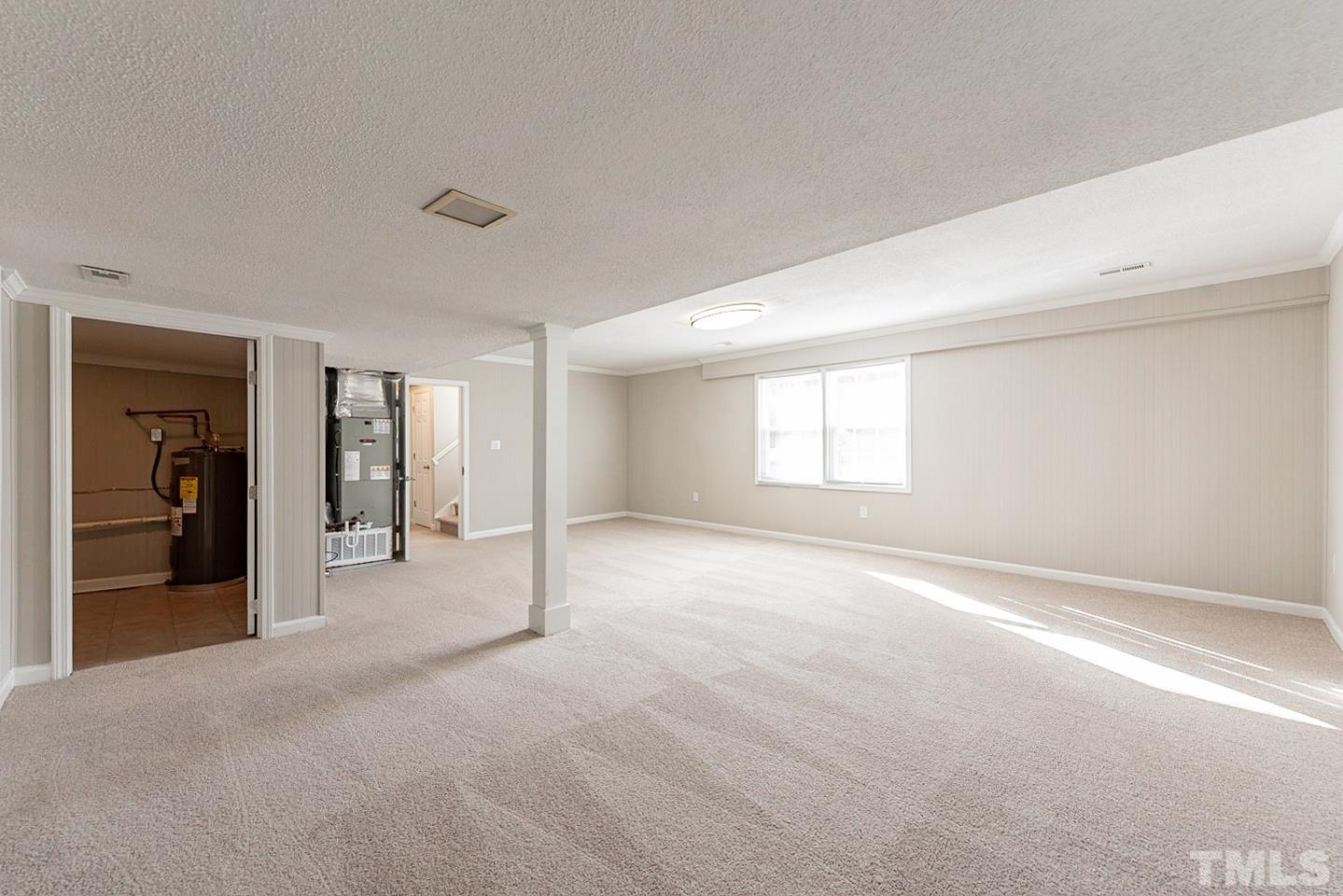 3601 Dixon Road Durham, NC 27707 - Photo 20 of 27 a view of a big room with closet and windows