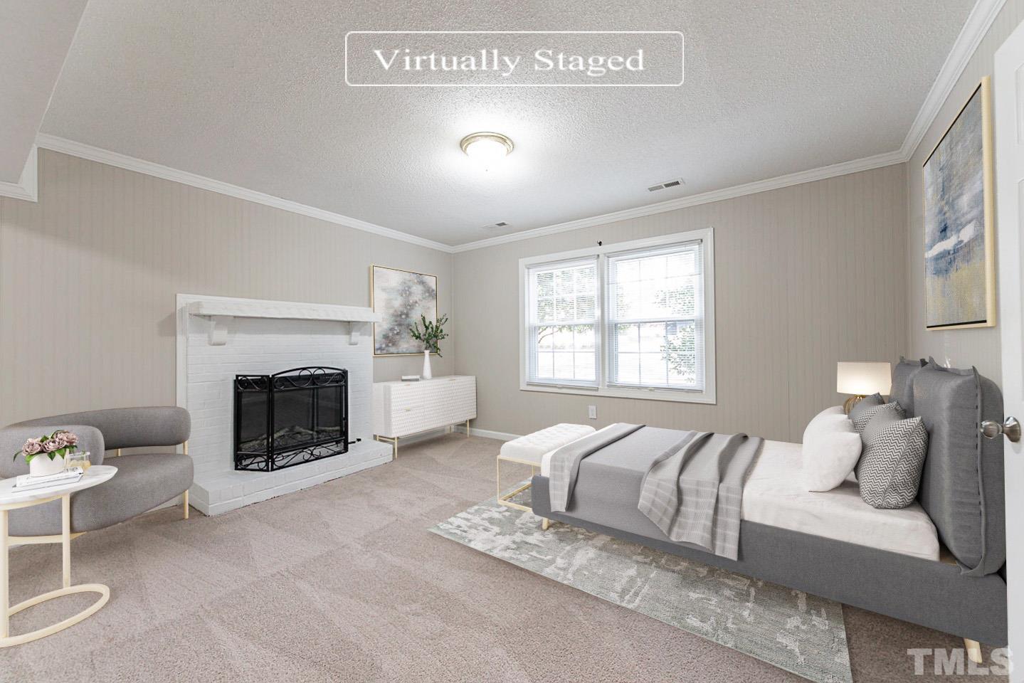 3601 Dixon Road Durham, NC 27707 - Photo 4 of 27 a living room with furniture a fireplace and a large window