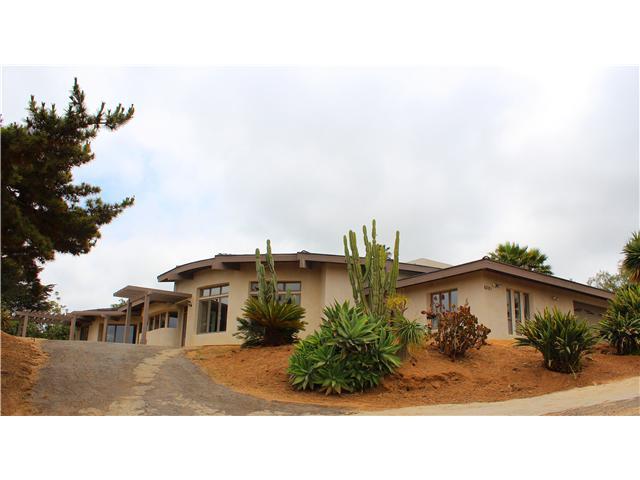 6391 West Lilac Road Bonsall, CA 92003 - Photo 1 of 10 Single level home. Character and style in a great, private location in the prestige area of Bonsall. Sweeping views of hills, valleys, and Luis San Rey Downs, in quality construction.
