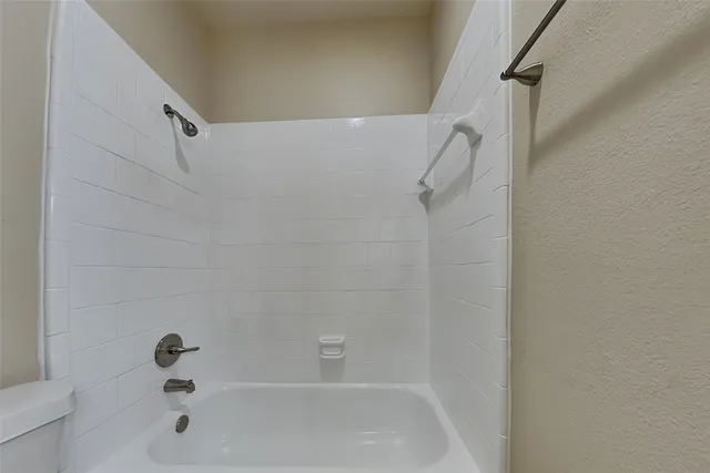 a bathroom with a bathtub