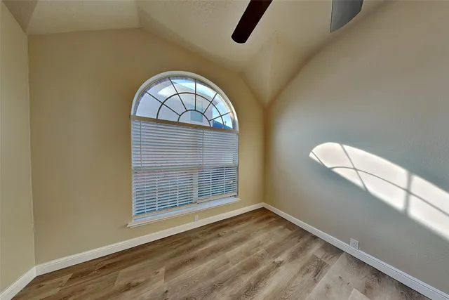 a view of empty room with a window