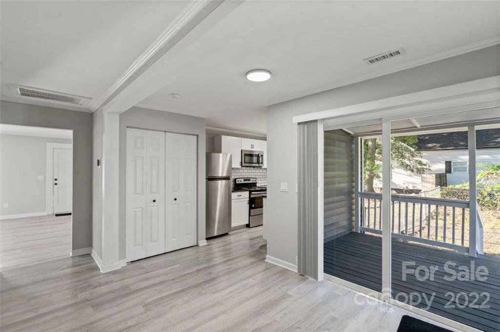 413 Modena Street Gastonia, NC 28054 - Photo 15 of 22 wooden floor and windows in a room