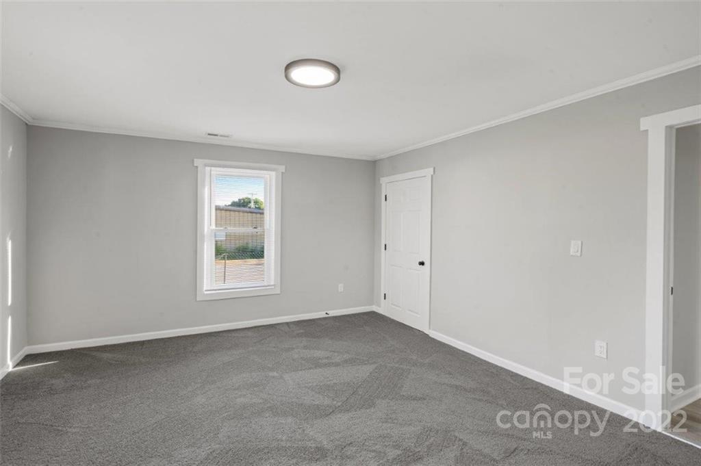 413 Modena Street Gastonia, NC 28054 - Photo 20 of 22 an empty room with a window