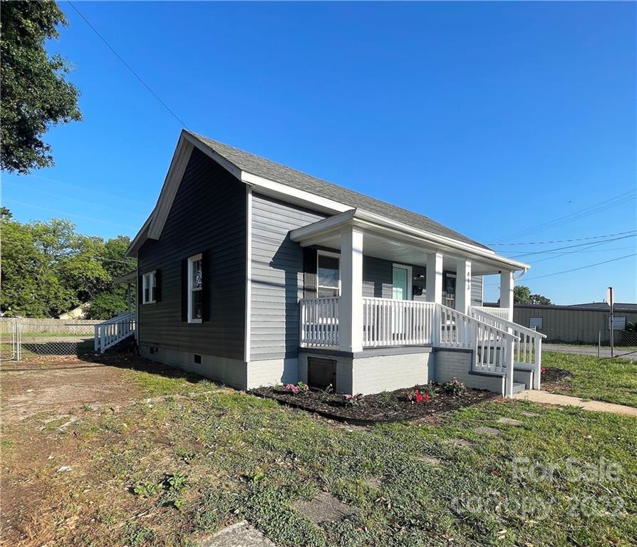 413 Modena Street Gastonia, NC 28054 - Photo 2 of 22 a front view of a house with a yard