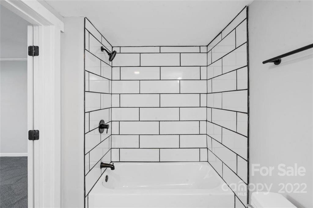 413 Modena Street Gastonia, NC 28054 - Photo 21 of 22 a bathroom with a shower