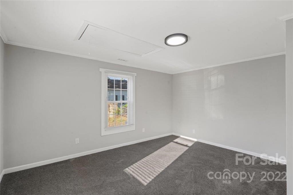413 Modena Street Gastonia, NC 28054 - Photo 10 of 22 an empty room with windows