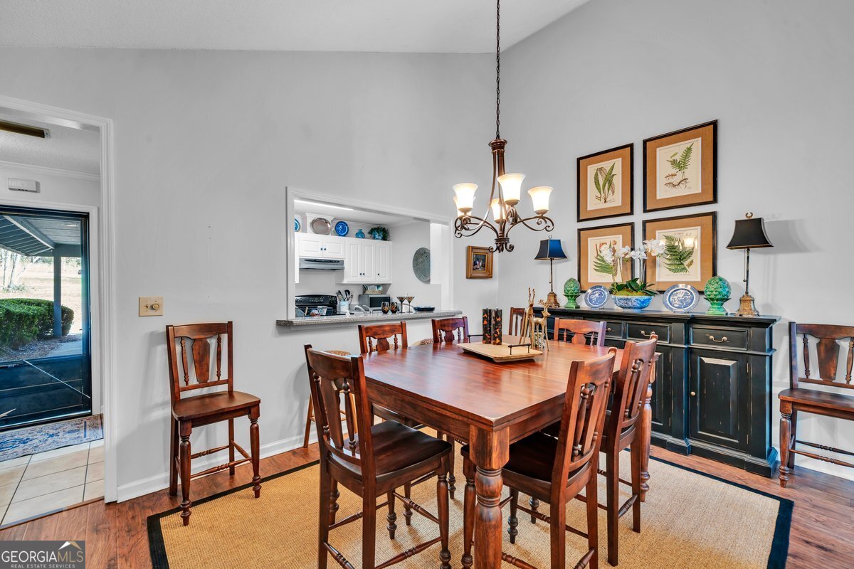 254 Valhalla Road South, Unit F Cordele, GA 31015 - Photo 12 of 41 a view of a dining room with furniture