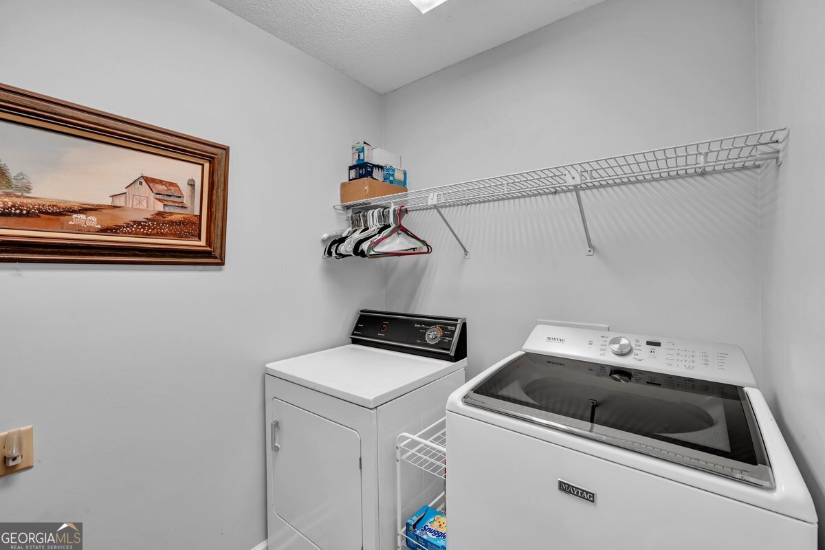 254 Valhalla Road South, Unit F Cordele, GA 31015 - Photo 17 of 41 a utility room with dryer and washer