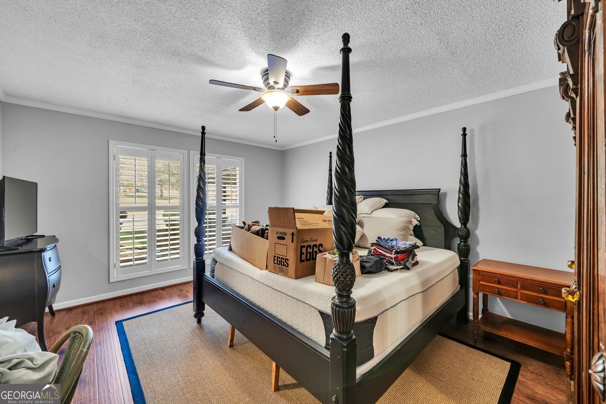 254 Valhalla Road South, Unit F Cordele, GA 31015 - Photo 19 of 41 a bed room with a bed and a window