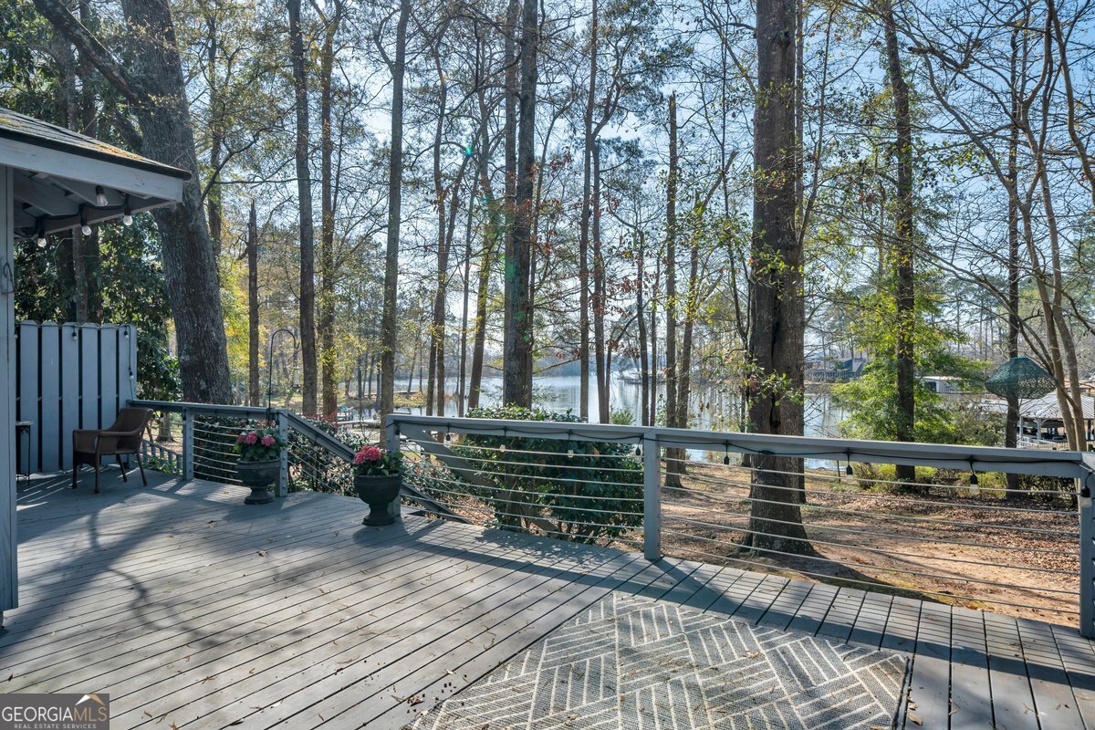 254 Valhalla Road South, Unit F Cordele, GA 31015 - Photo 28 of 41 a view of outdoor space with deck and yard